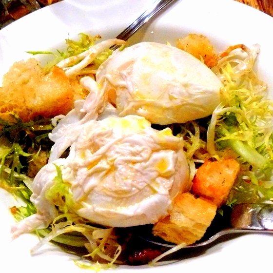 Poached egg & frisee salad at Olivar.JPG